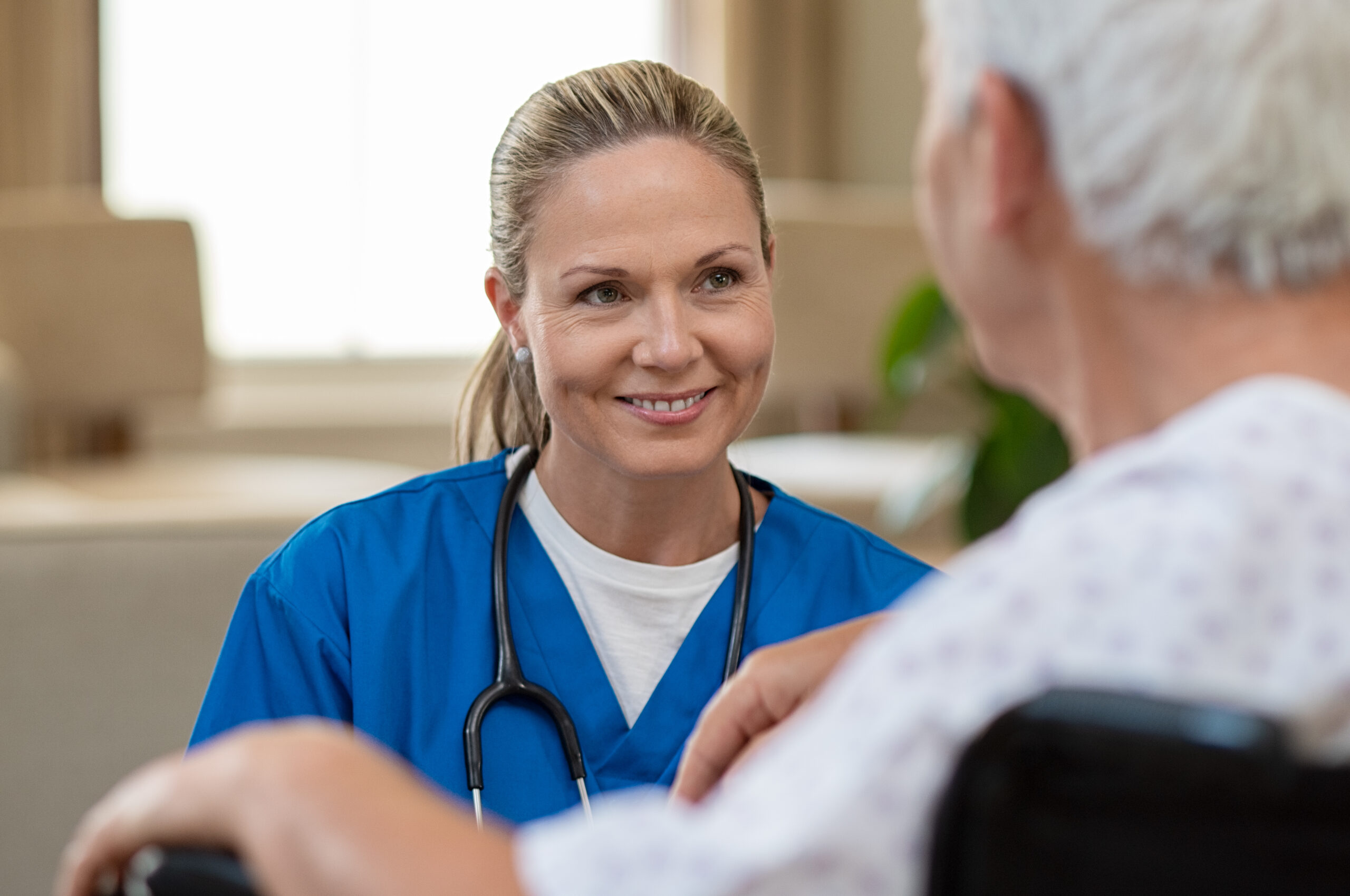 nurse with patient dreamstime xxl 125353231